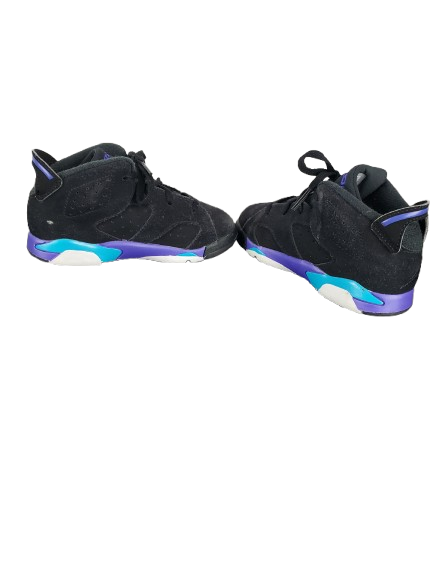 Black and blue sneakers on a white background