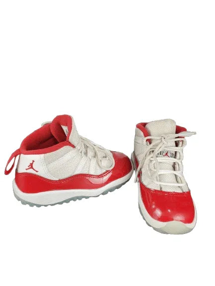 Red and white sneakers on a white background