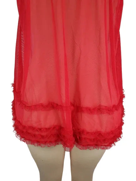 Red sheer dress with lace details on a white background