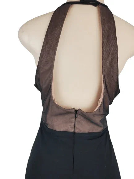 Brown and black dress with open back on a mannequin against a white background