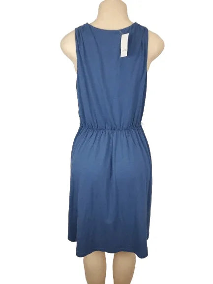 Blue dress on a mannequin against a white background