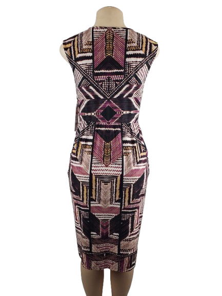 Patterned dress on a mannequin against a white background