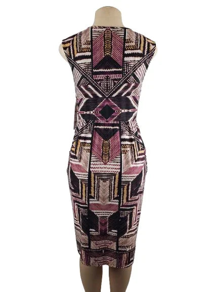 Patterned dress on a mannequin against a white background