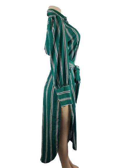 Green and white striped dress on a mannequin against a white background