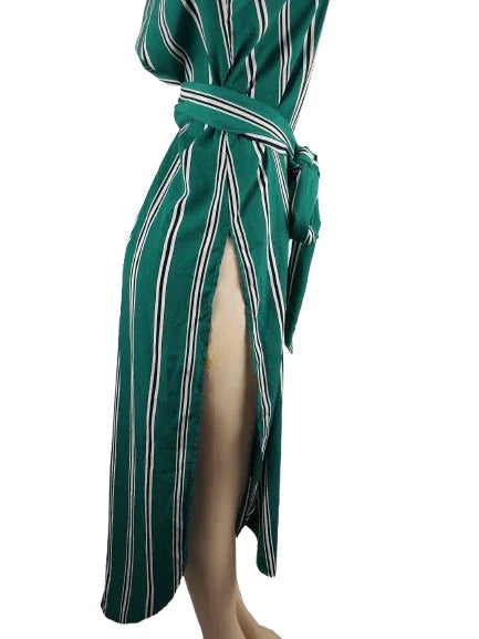 Green and white striped dress on a mannequin against a white background