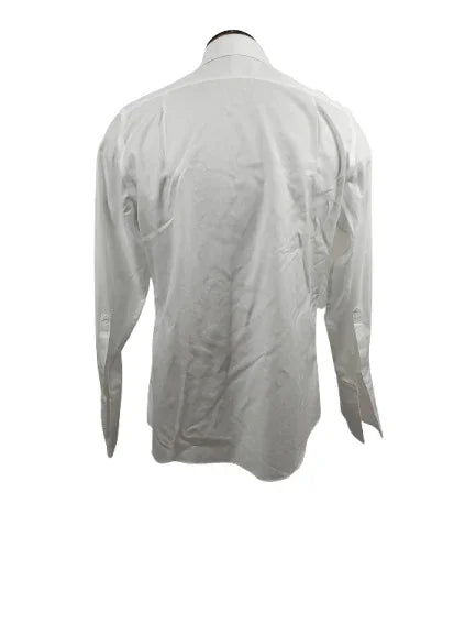 White dress shirt on a mannequin against a white background