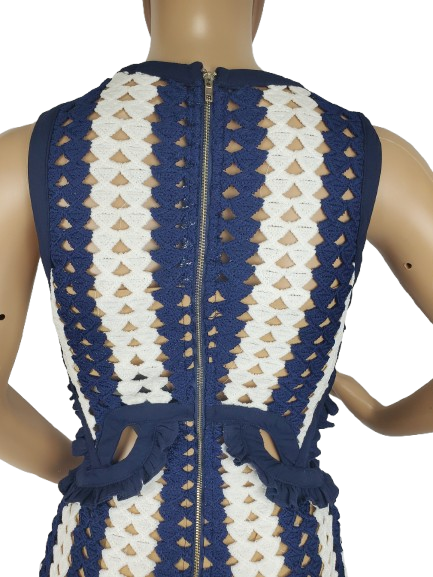 Mannequin wearing a blue and white patterned dress with a zipper.