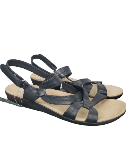 Black sandals with multiple straps on a white background