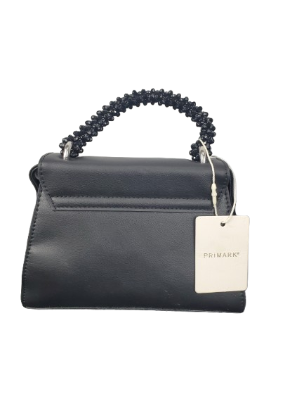 Black handbag with a visible Primark tag on a white background