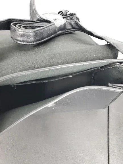 Close-up of a car's side mirror with a strap on a white background