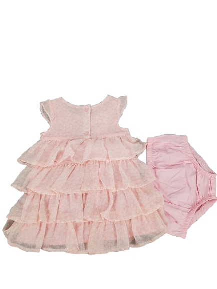 Pink pet dress with ruffled details on a white background