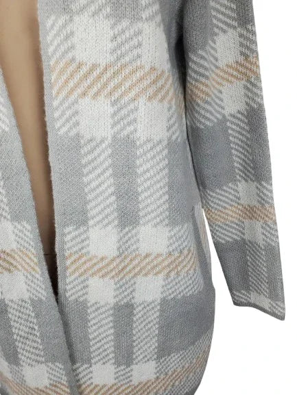 Plaid patterned cardigan with a focus on texture and color.