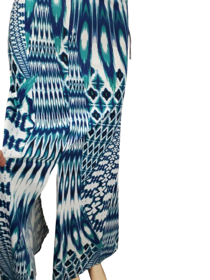 Blue and white patterned dress on a white background