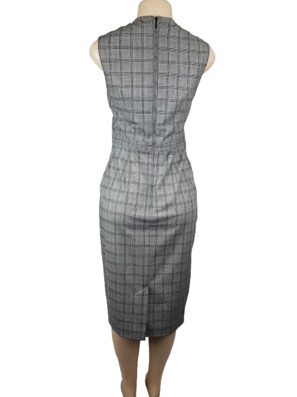 Plaid dress on a mannequin against a white background