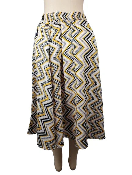 Patterned skirt on a mannequin against a white background