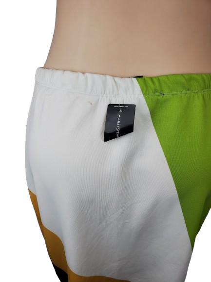 Color-blocked shorts with a brand tag on a white background
