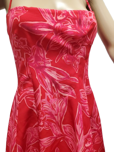 Red dress with pink floral pattern on a white background