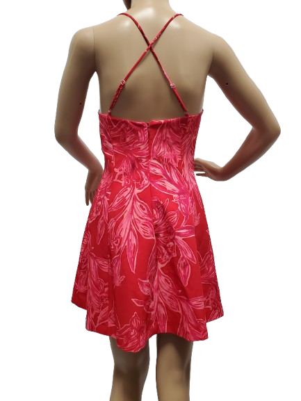 Red dress with white floral pattern on a white background