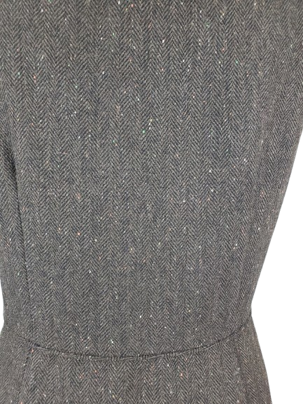 Close-up of a brown textured fabric with a subtle pattern