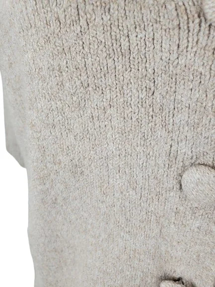 Close-up of a textured stone surface with a slight gradient.