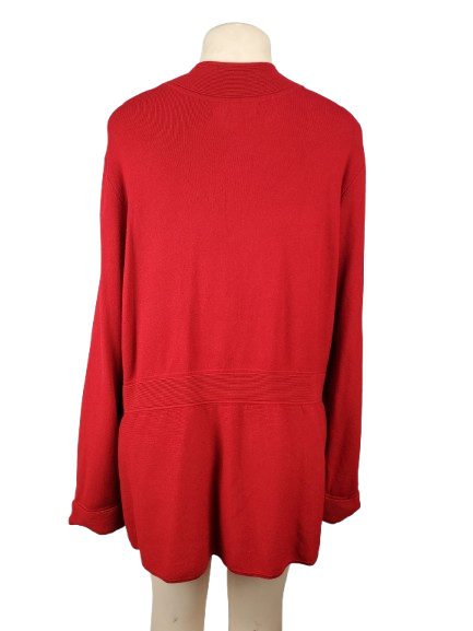 Red sweater on a mannequin against a white background