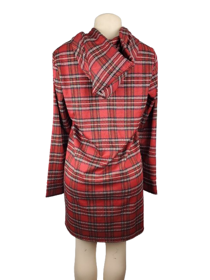 Red plaid dress on a mannequin against a white background