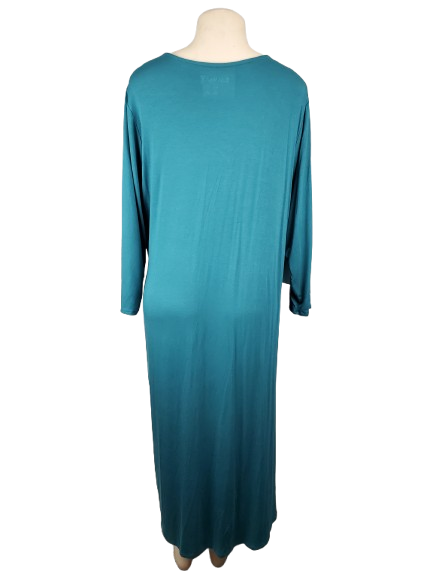 Teal dress on a mannequin against a white background