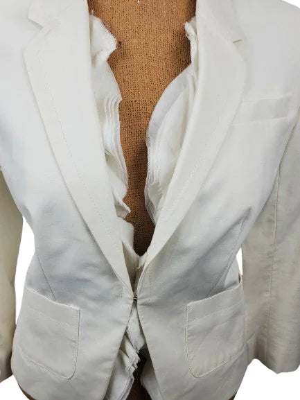 off White blazer on a mannequin with a plain background