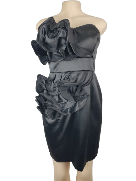 Black tube satin cocktail dress with large ruffle accents displayed on mannequin.