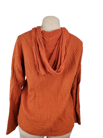 Women’s orange textured zip-up hoodie with tie detail and front pockets displayed on mannequin.