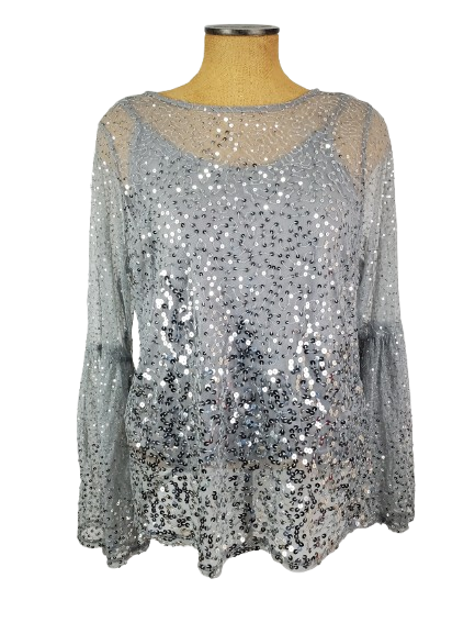 Silver sequin top on a mannequin against a white background