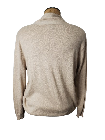 Beige sweater on a mannequin against a white background