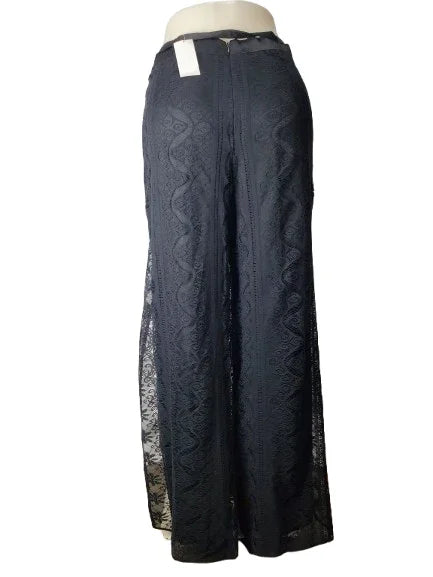 black pants with lace detailing on a white background