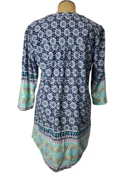Blue and white patterned kurta on a mannequin with a white background