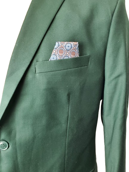Green suit jacket with a patterned pocket square on a white background