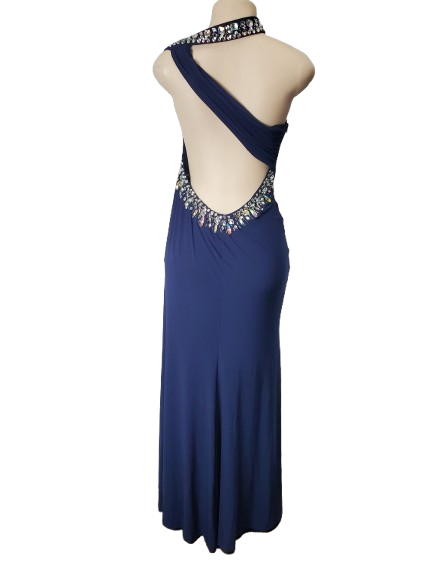 Navy blue evening gown with embellishments on a white background