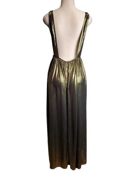 Gold evening gown on a mannequin against a white background