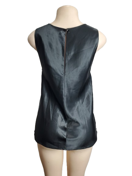Black sleeveless top on a mannequin with a white background