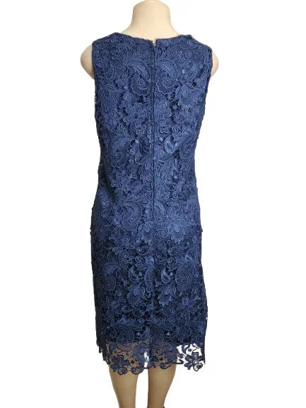 Blue lace dress on a mannequin against a white background
