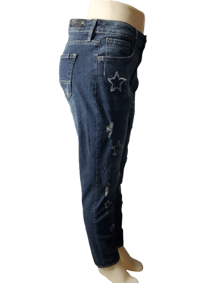 Blue jeans with star designs on a white background