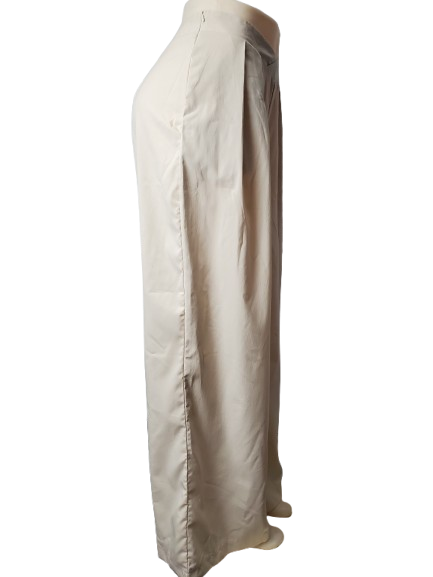 Beige pants on a mannequin against a white background