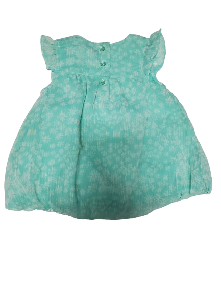 green baby dress with white floral pattern on a white background