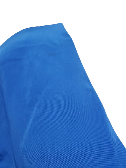 Close-up of a blue fabric texture on a white background