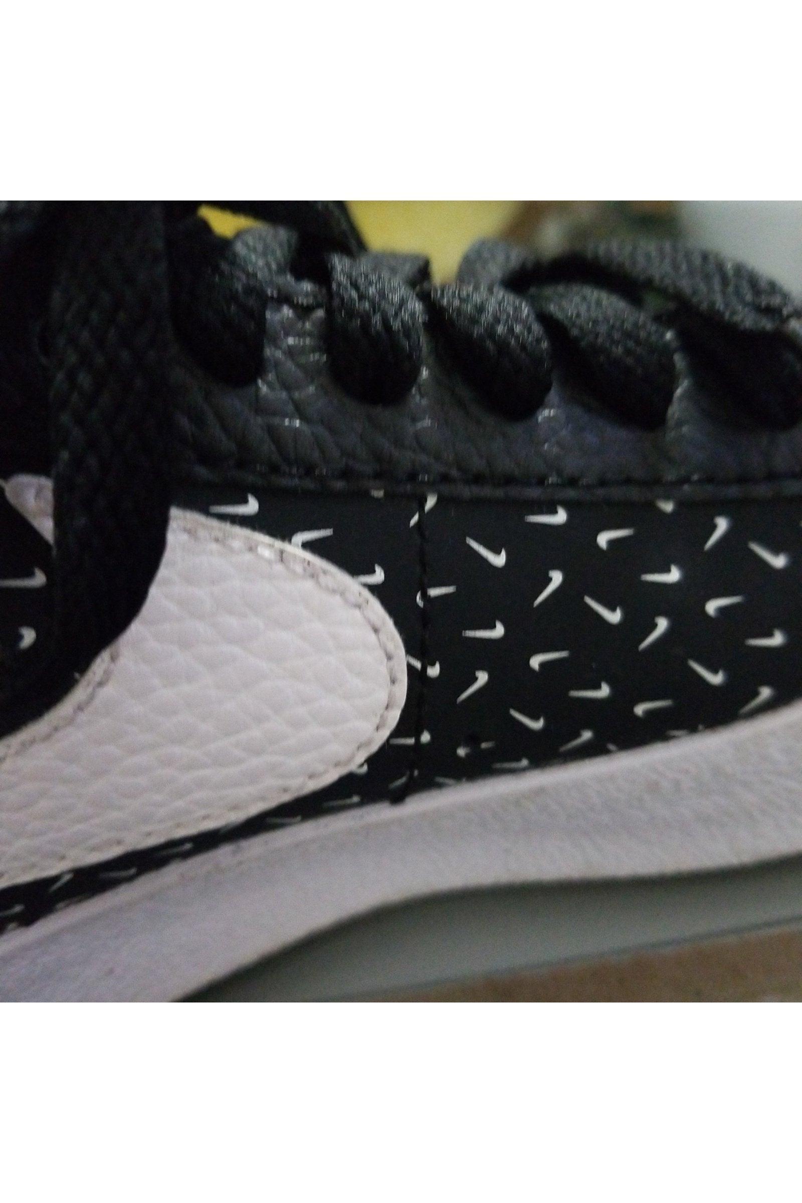 Nike unisex kids Mid '77 black/white polka swoosh sneakers size 4Y - Solé Resale Boutique thrift