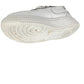 White sneaker with a focus on sole design on a white background