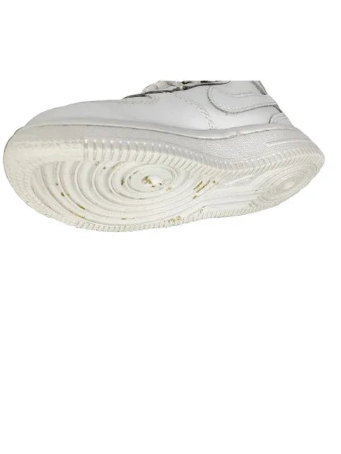 White sneaker with a focus on sole design on a white background