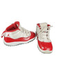 Red and white sneakers on a white background