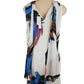 Colorful sleeveless top on a mannequin with a white background