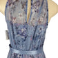 Floral dress on a mannequin with a white background