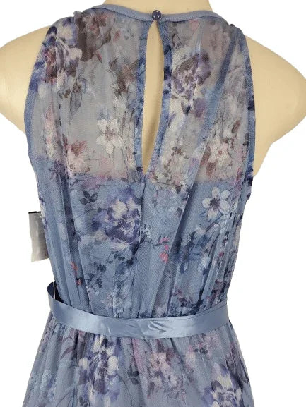 Floral dress on a mannequin with a white background